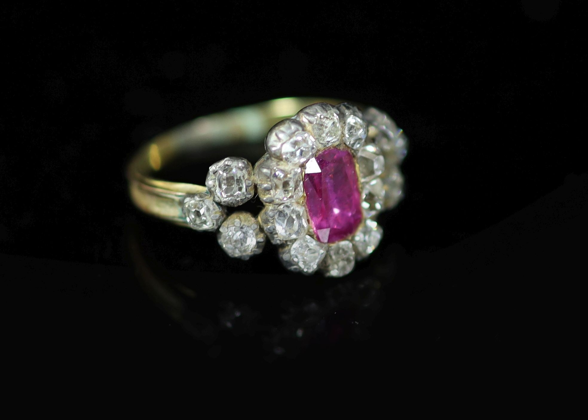 A George IV gold and silver, foil backed pink stone and old mine cut diamond set cluster memorial ring